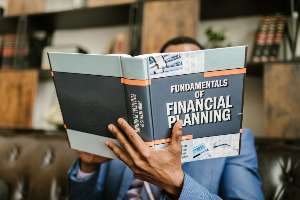 A person reading about financial planning