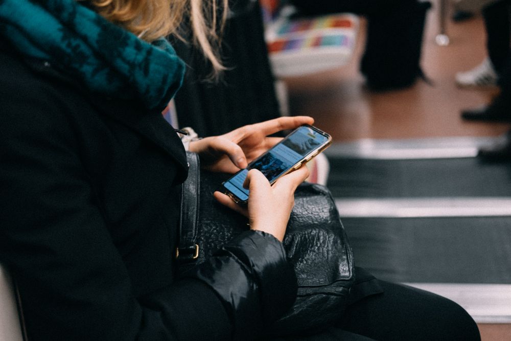 A person checking their balance on a phone